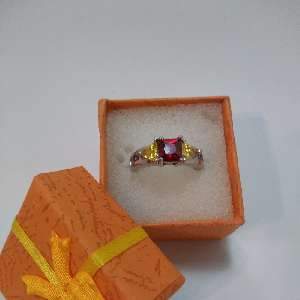 Very cute multi color ring. Size 7